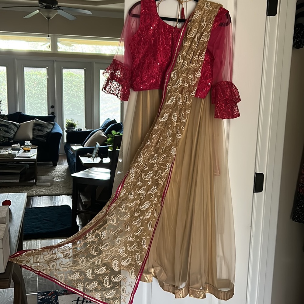 Gold and pink Indian Lehenga with paisley dupatta